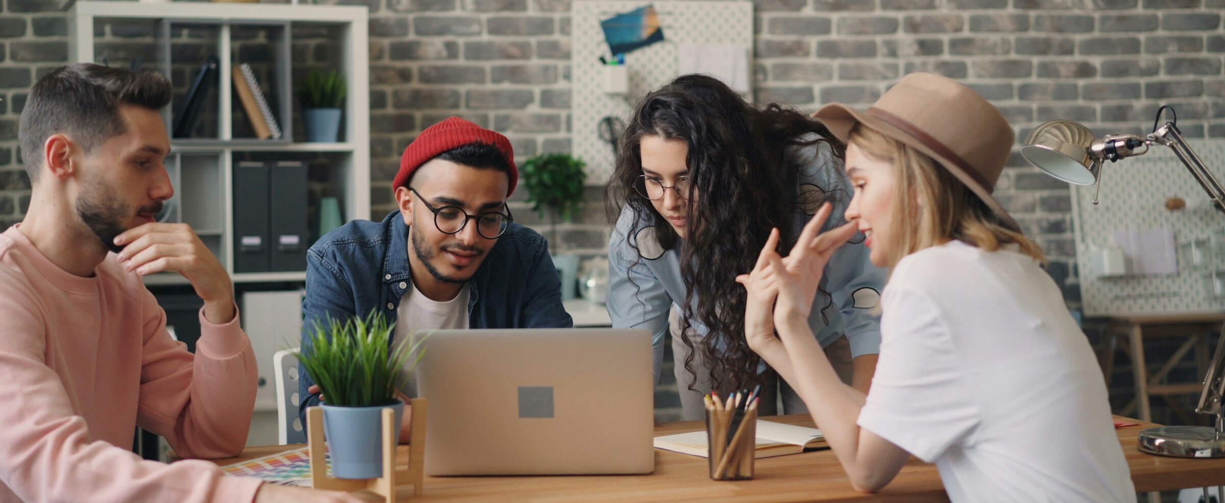A relaxed team discussing a project